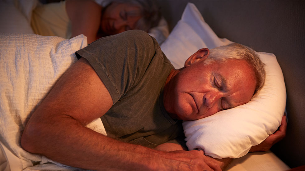 couple sleeping in bed