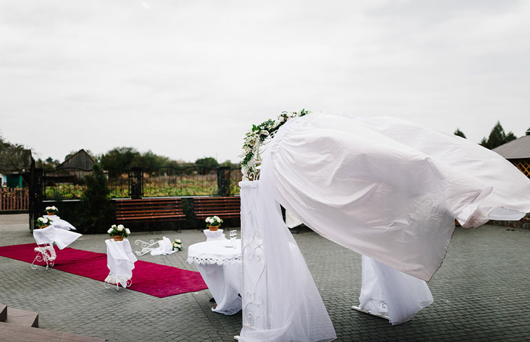 Strong wind, rain and bad weather. Wedding location.