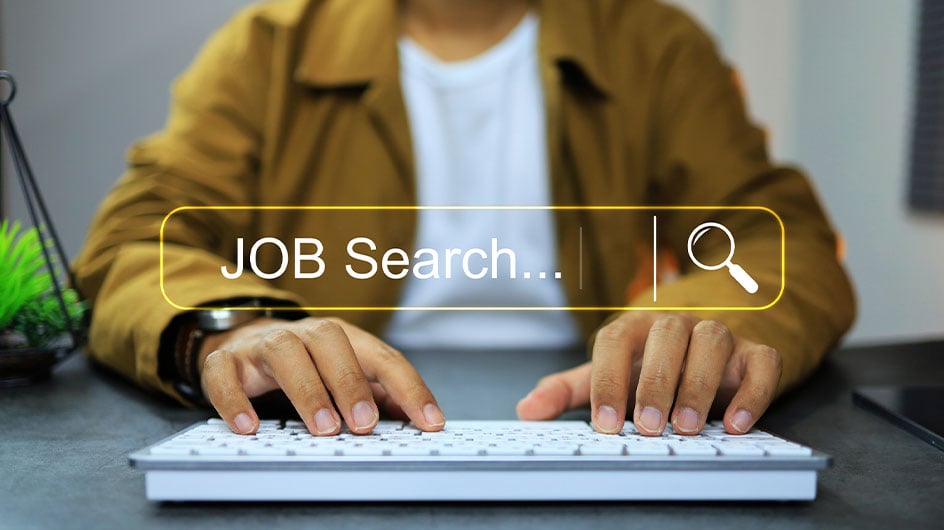 man searching job search in web browser