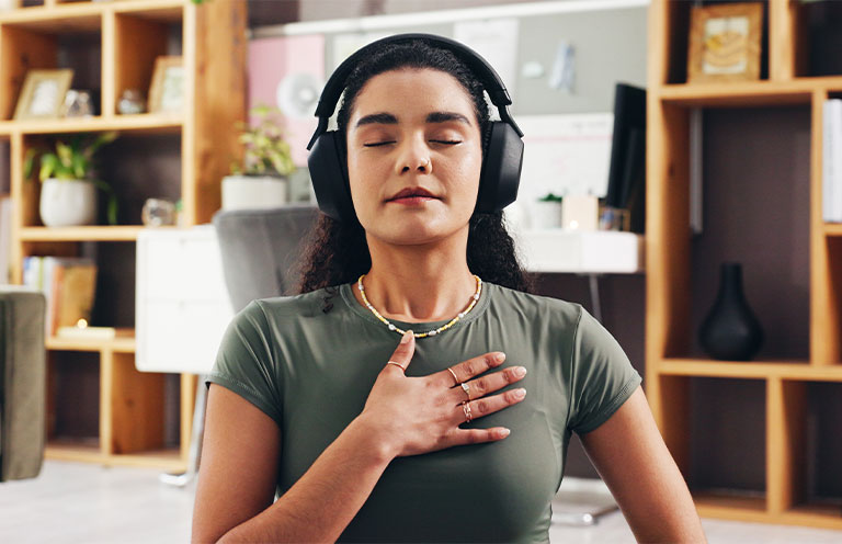 woman with overhead headphones on