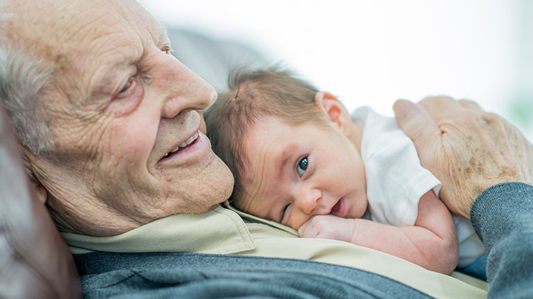 Senior Couple Enjoying Summer Day Trip Out Driving In Car Together; Credit: monkeybusinessimages
