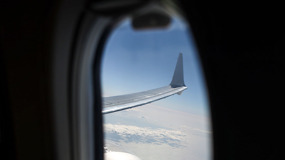 view of plane wing from plane window