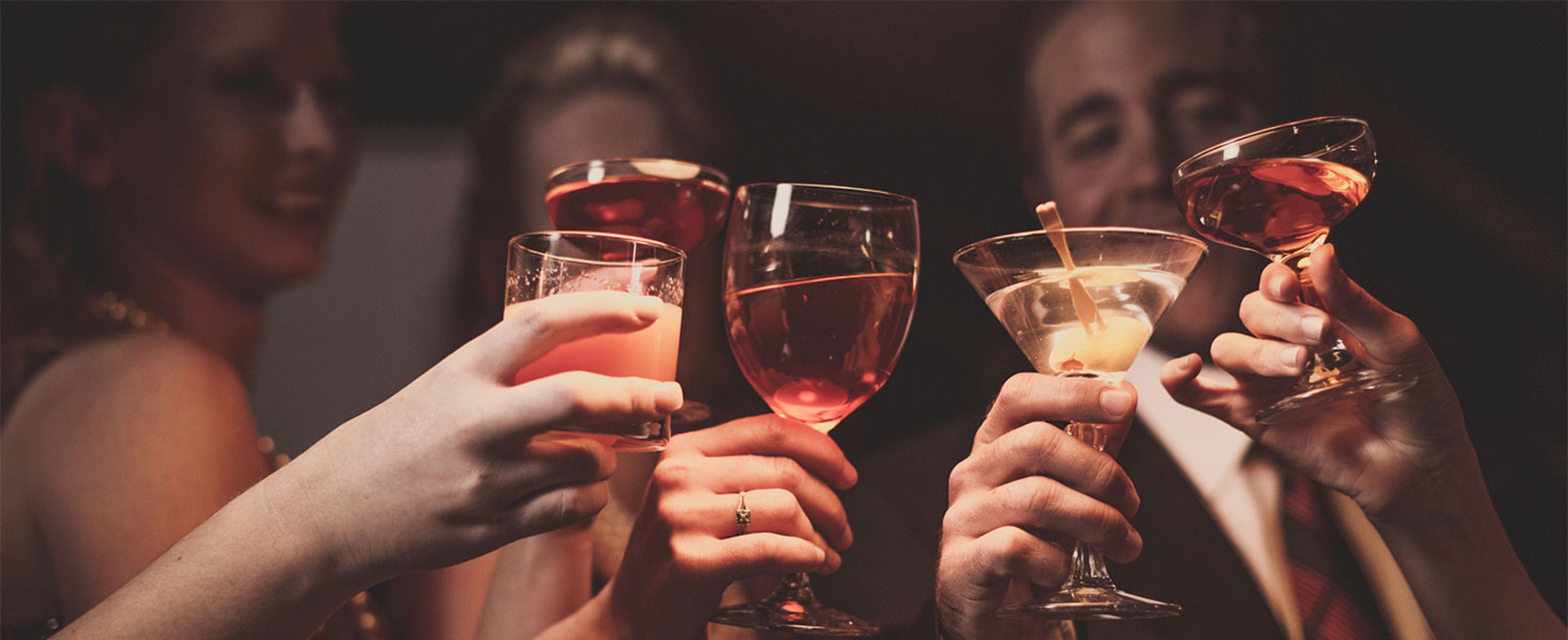 friends making a toast with drinks