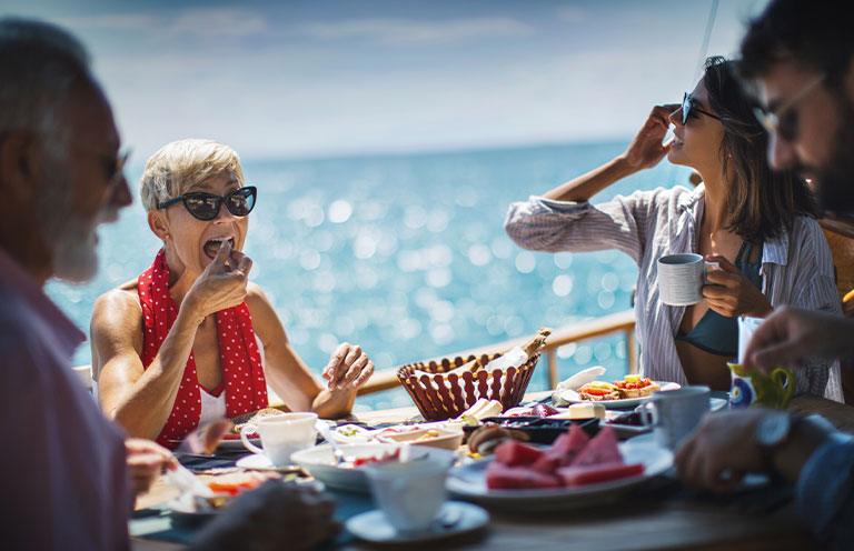 Family having a Breakfast on boat