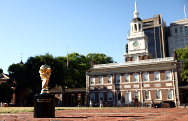 Fifa trophy on the ground in front of Independence Hall in Philadelphia