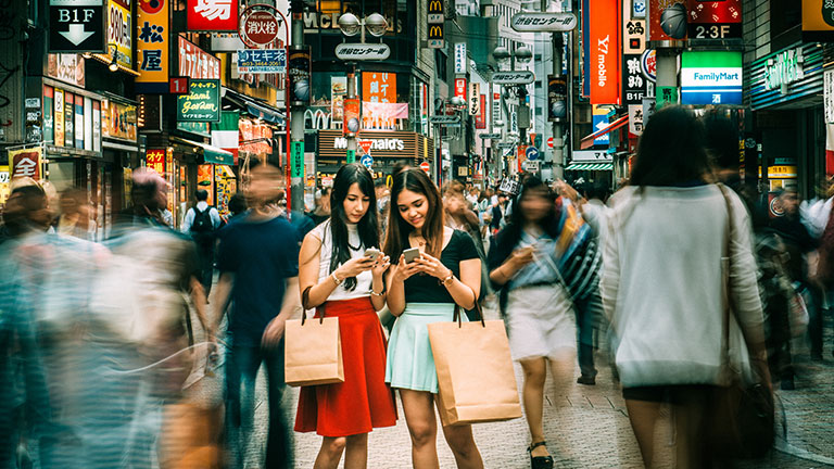 Japanese girlfriends hanging out on Shibuya streets of Tokyo. Japan. Credit: ferrantraite