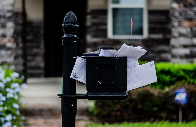 mail overflowing out of mailbox
