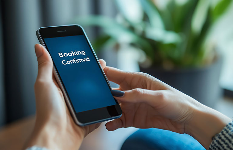 man making hotel reservation