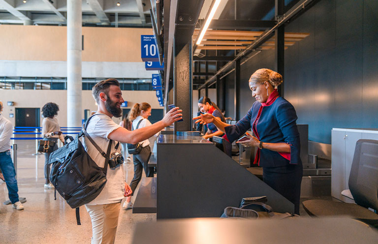 man checking in at airport