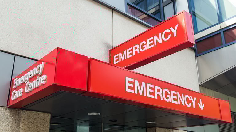 Entrance to hospital emergency department at St Vincent's Hospital in Melbourne, Australia. The sign is red with the word EMERGENCY prominently displayed. It can be used to illustrate various healthcare, medical and emergency concepts, from afflictions such as stroke or heart attack, diseases such as HIV or cancer, and accidents such as road trauma or sporting injury. Credit:NilsBV