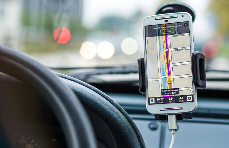 gps ap on phone mounted to car windshield 