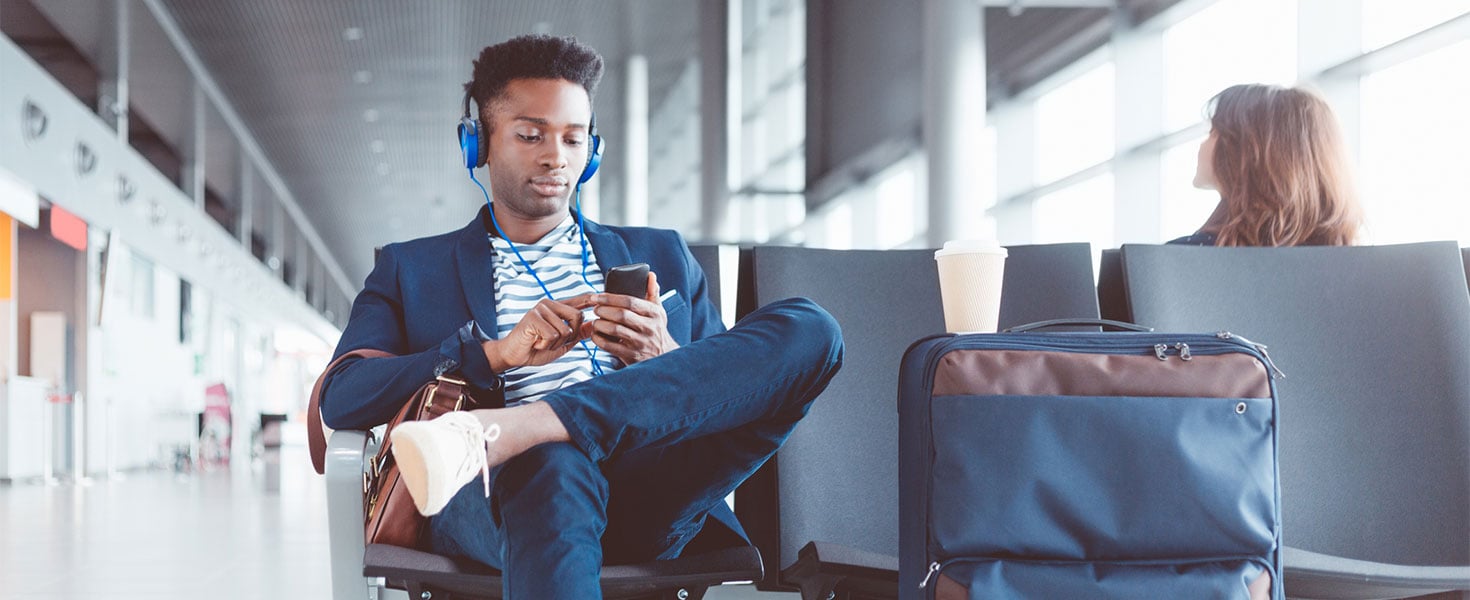 man waiting at airport