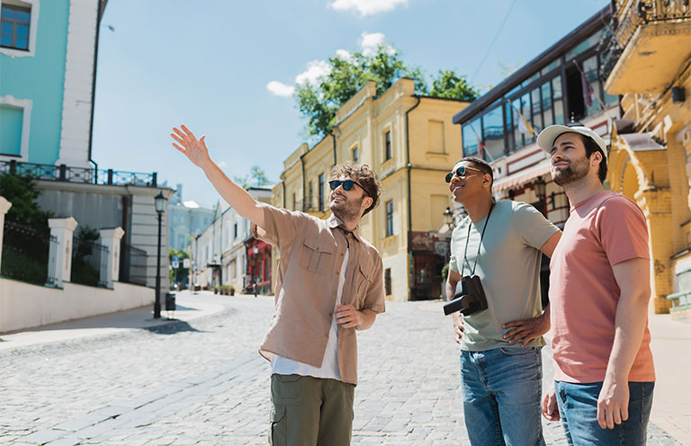 two men being shown area on a tour