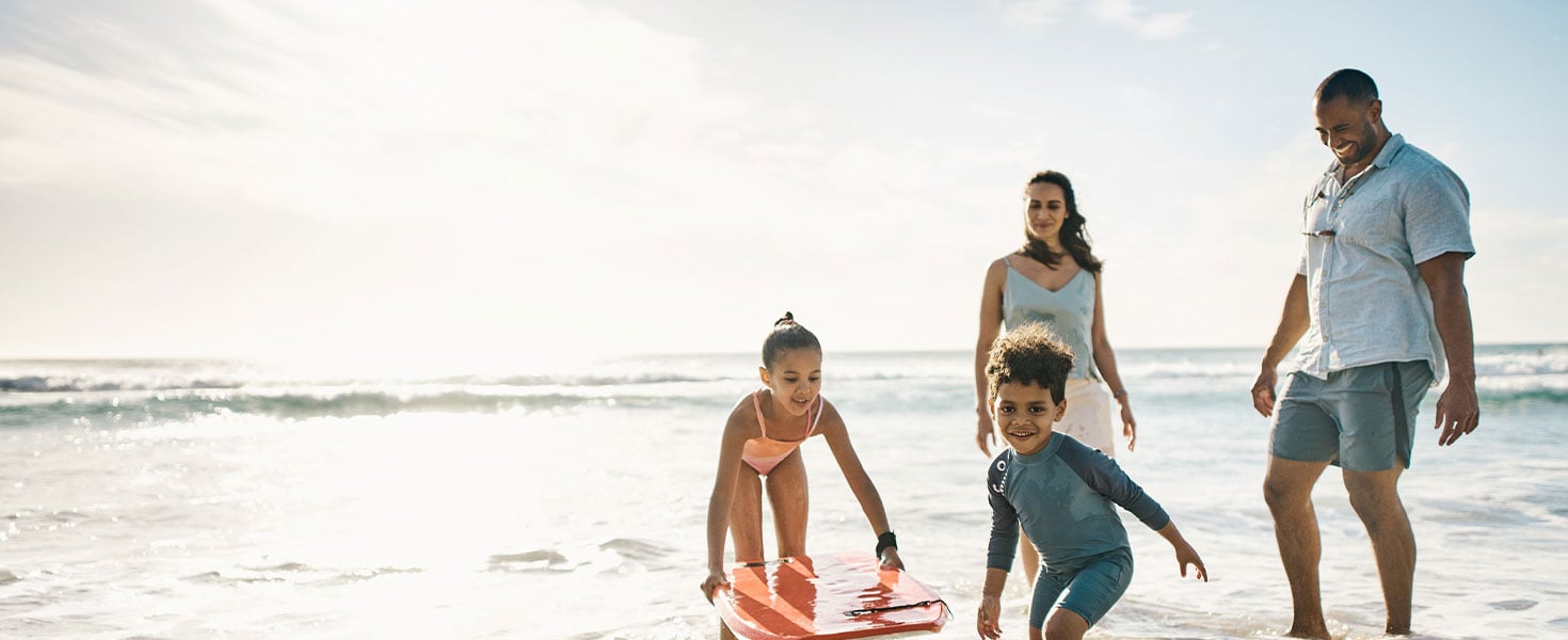 Family playing on beach