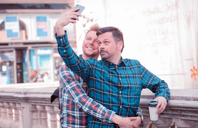 two men taking selfie together