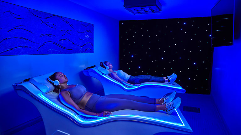 Guests at Carillon Miami relax in smart chairs as part of the Sleep Well Retreat experience; photo courtesy of Carillon Miami Wellness Resort