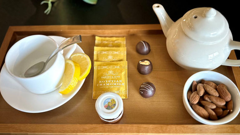 Loews Chicago O’Hare’s Sleep Better Package includes sleep-friendly snacks and soothing tea as part of its in-room wellness menu; photo courtesy of Loews Chicago O'Hare Hotel