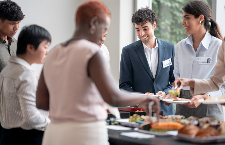 business workers at a buffet