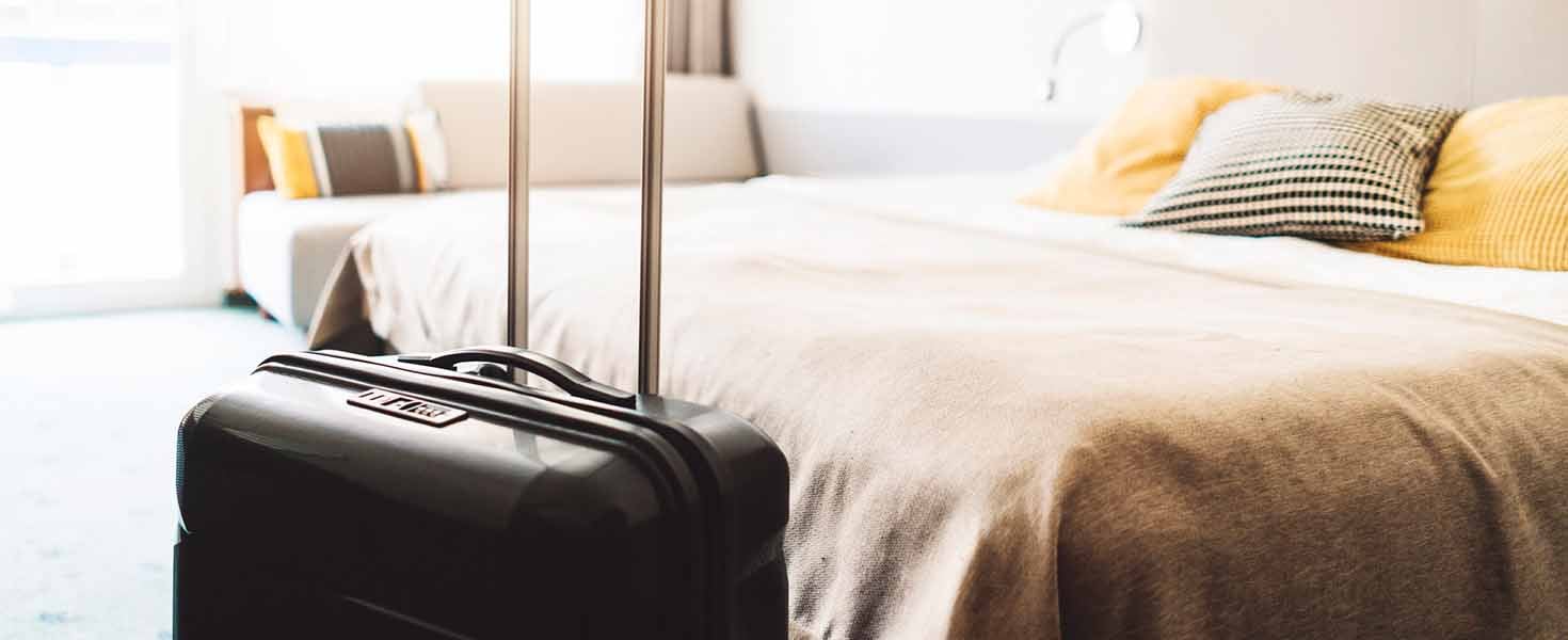 Suitcase on Bed