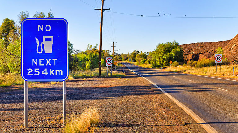 Large warning road sign no fuel next 250 kilometers on a highway off Cobar town in outback australia. Credit: zetter