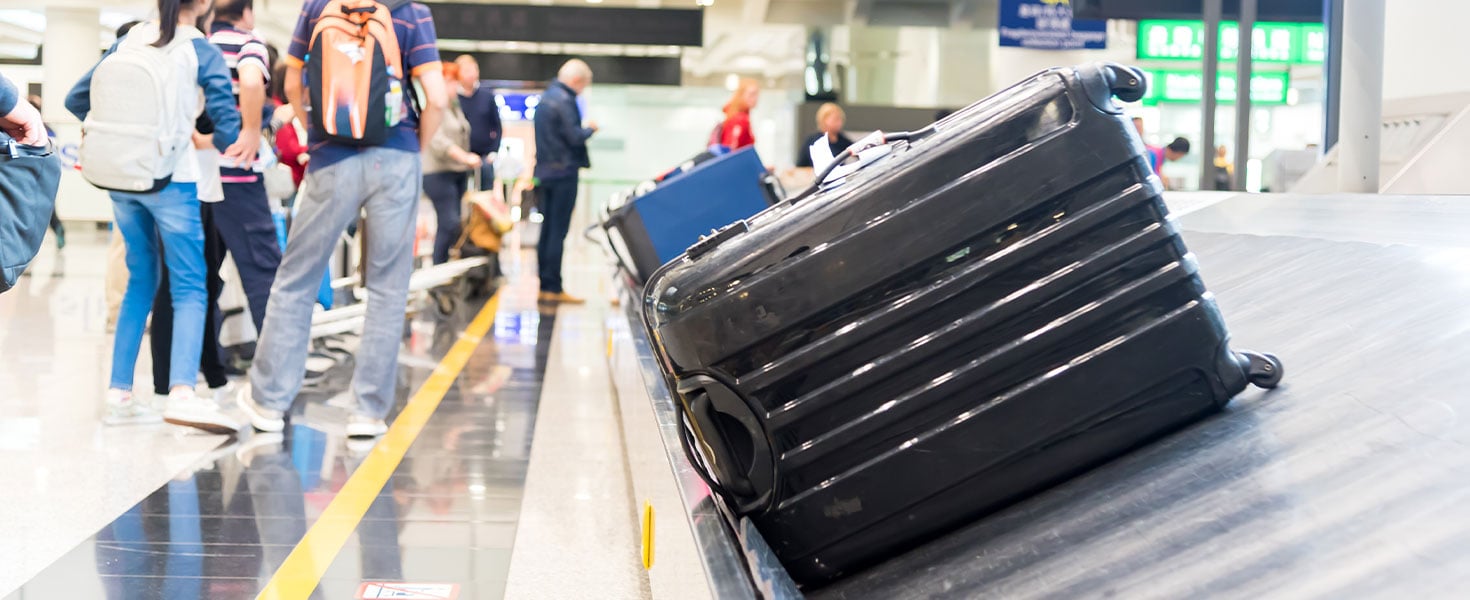 suitcase on conveyer belt