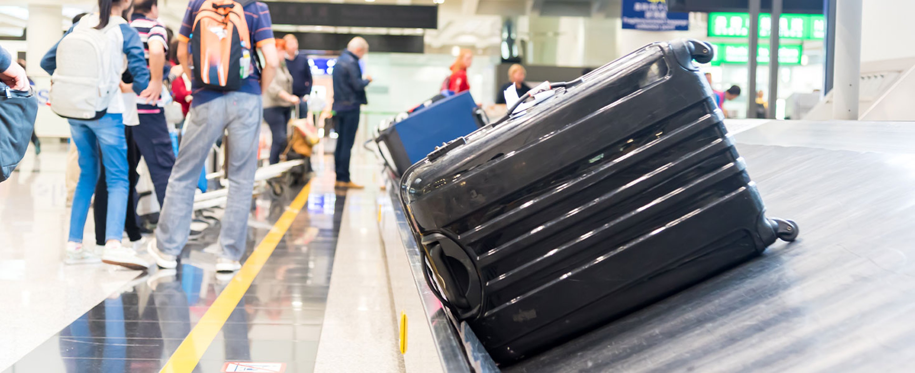 suitcase on conveyer belt