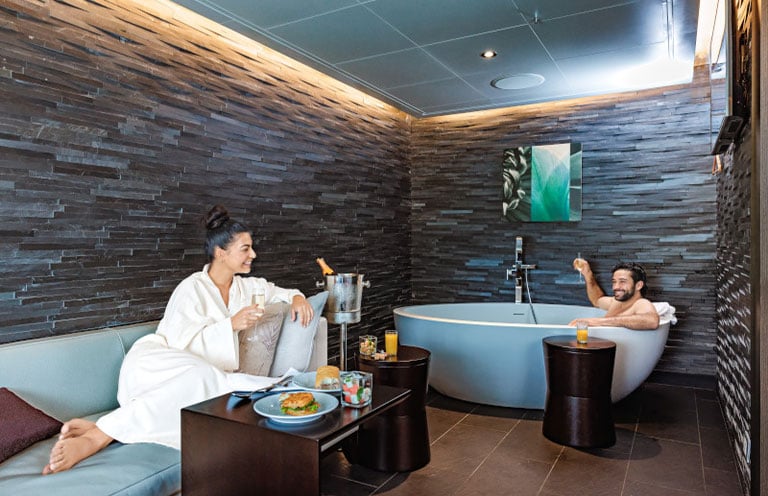 man and woman enjoying spa