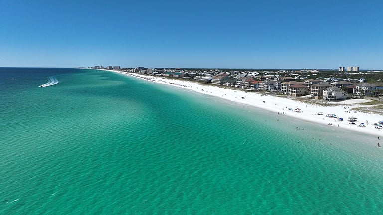 Endless turquoise waters and sugar-white sands define the breathtaking coastline of Destin, Florida; Photo by Cole Thurmon, Destin Drone Solutions