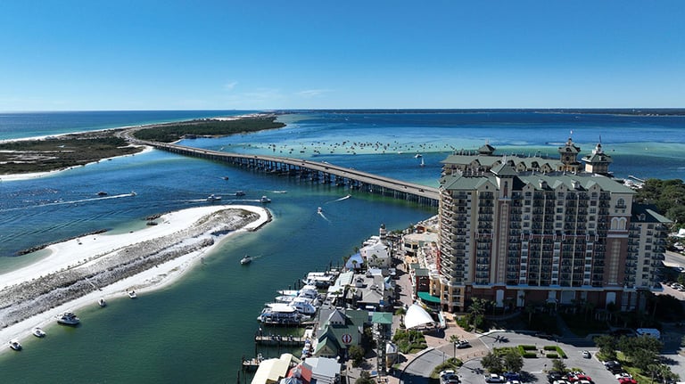 Sun-kissed shores and crystal-clear waters surround Destin, Florida, offering a perfect escape along the Emerald Coast; Photo by Cole Thurmon, Destin Drone Solutions.