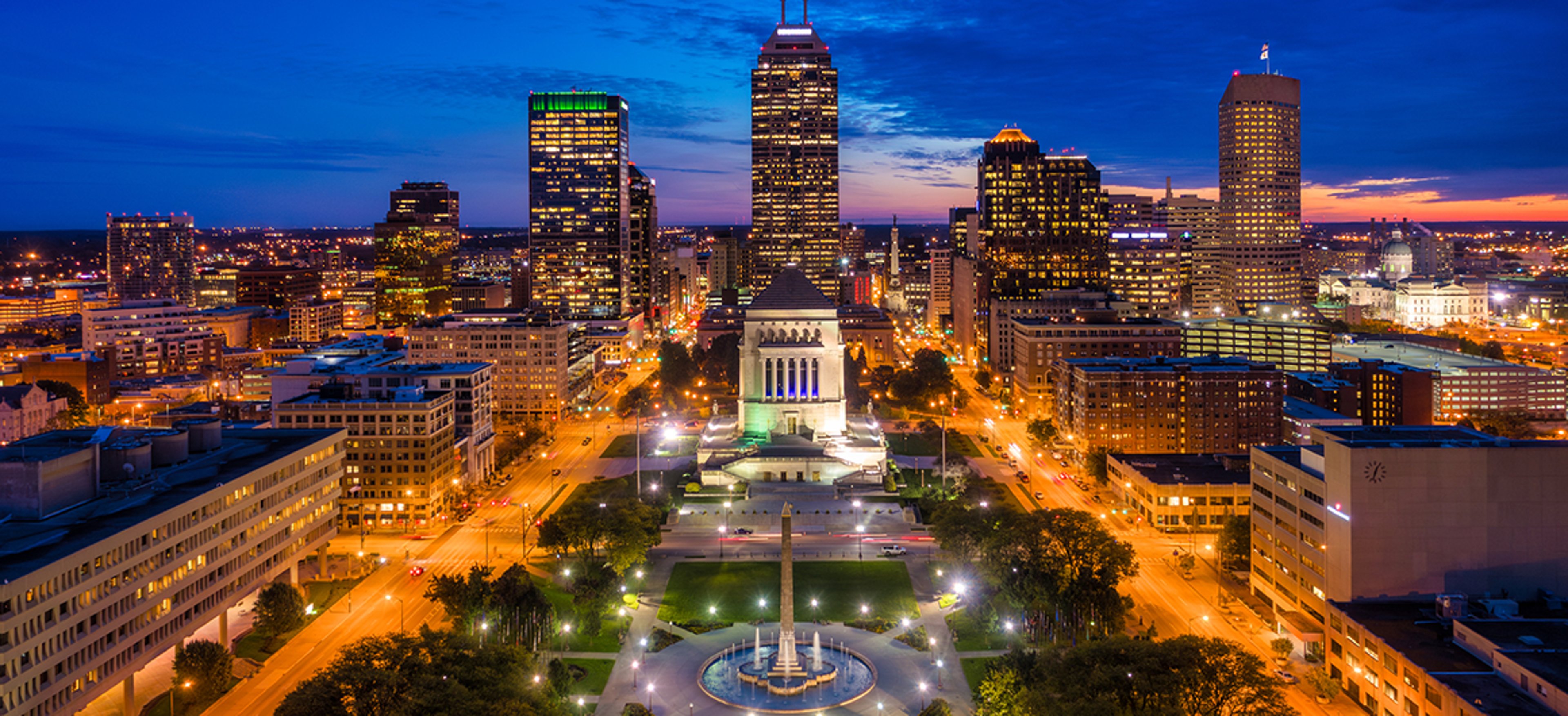 Indianapolis Skyline Aerial At Dusk With Fountains; Credit: Dee Liu