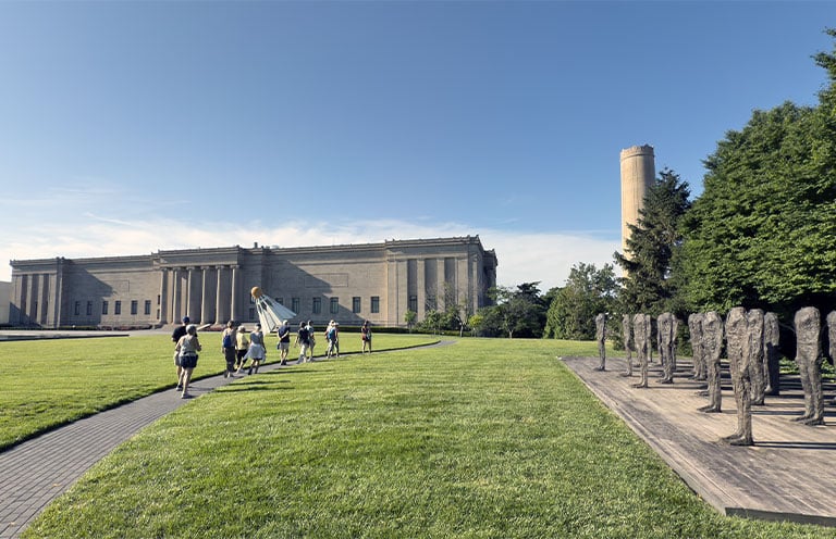 People walking in front of the Nelson Atkins Museum of Art