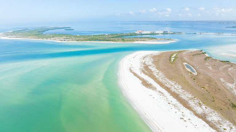 Caladesi Island’s clear waters and white-sand shoreline; photo courtesy of Visit St. Pete/Clearwater