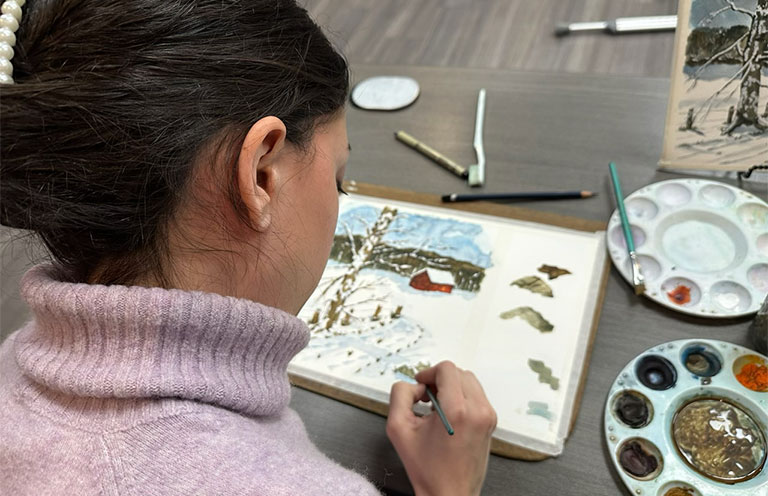 woman painting picture