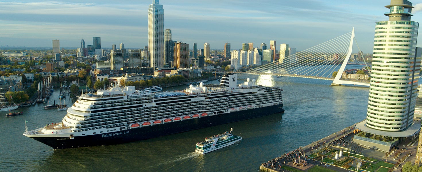 Cruise ship sailing past Rotterdam’s skyline; photo courtesy of Holland America Line