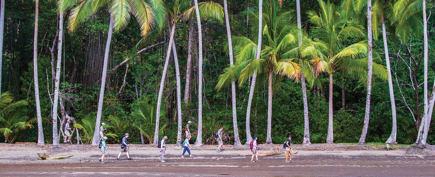 Hikers on a Coasta Rican beach