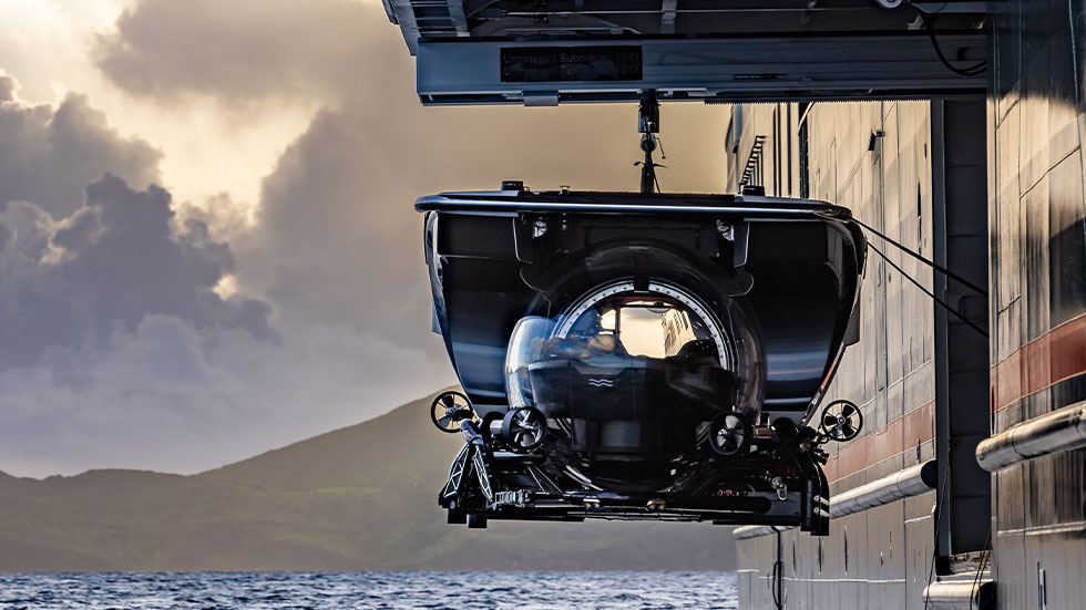 a submarine launching from a Seabourn ship