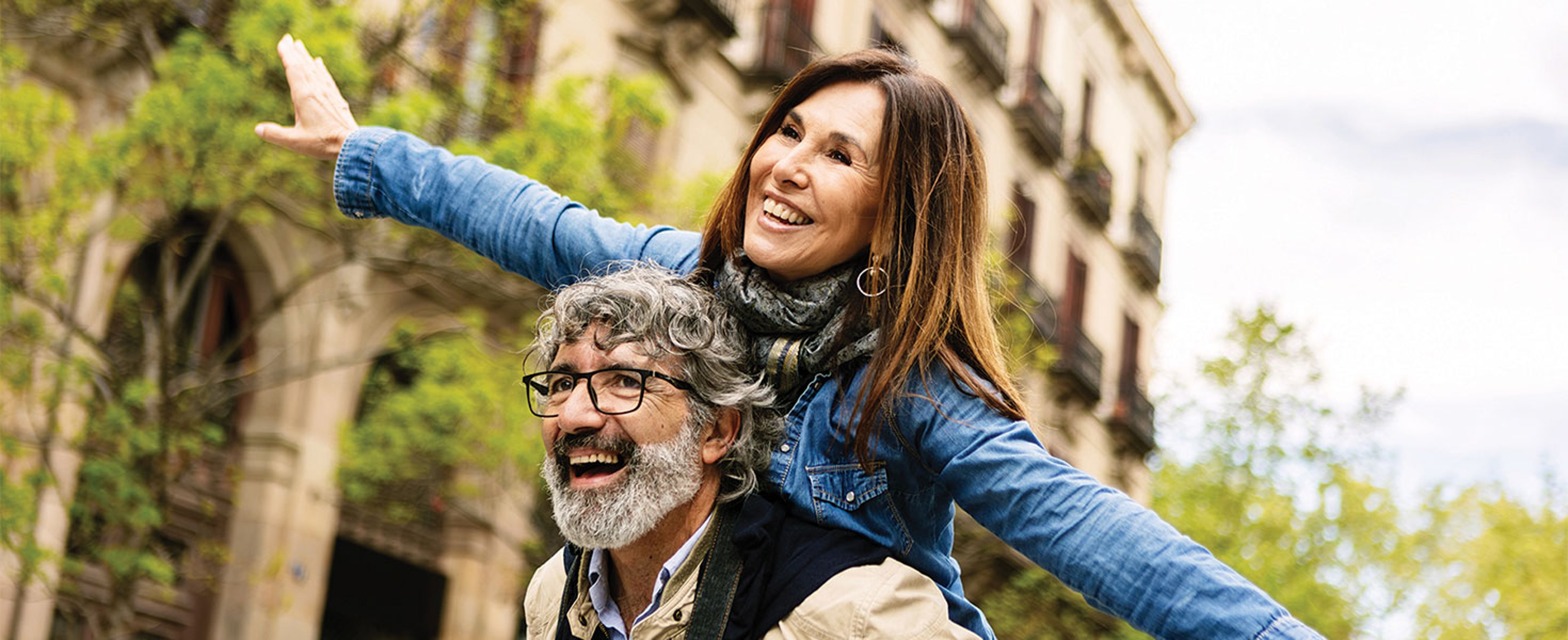 Woman getting a piggyback ride from man