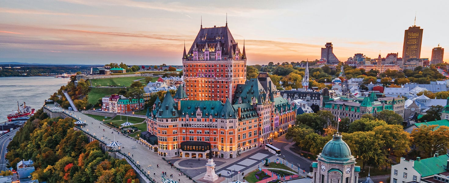 Fairmont Le Château Frontenac and Terrasse Dufferin overlook the Saint Lawrence River