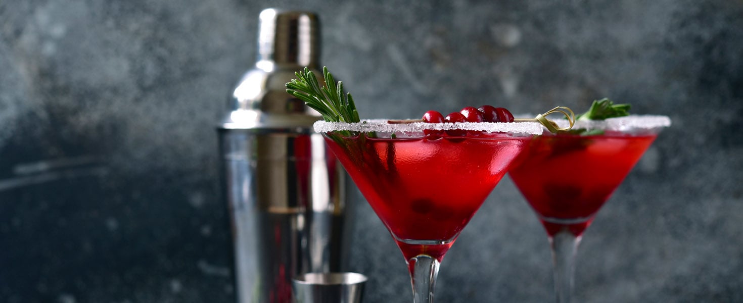 Alcoholic Cranberry Cocktail in cocktail glasses