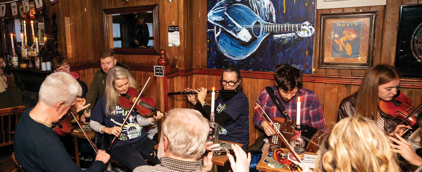 Lively music session taking place at Madden’s Bar, Belfast, Ireland