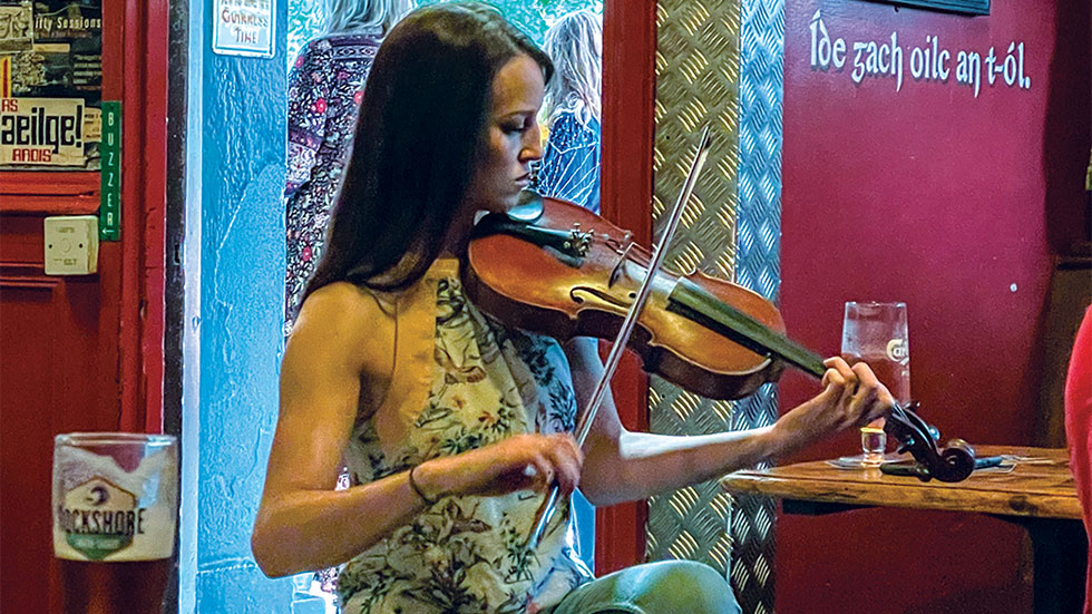 woman playing a fiddle