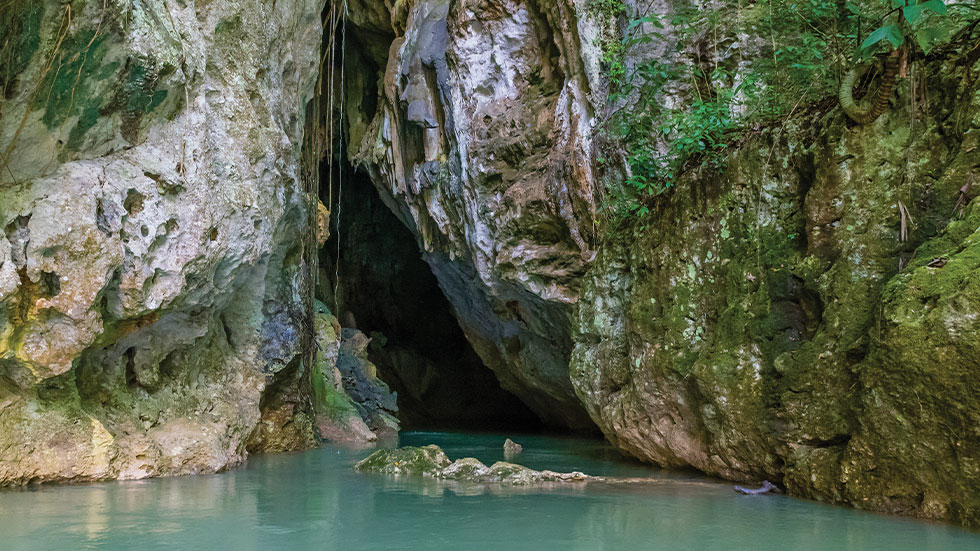 stalactites; below, cave entrance
