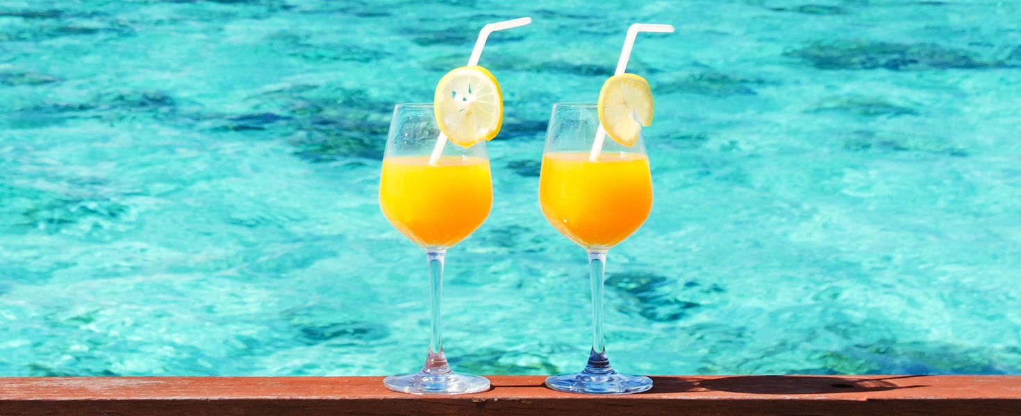Two fruity cocktails on the sea view terrace