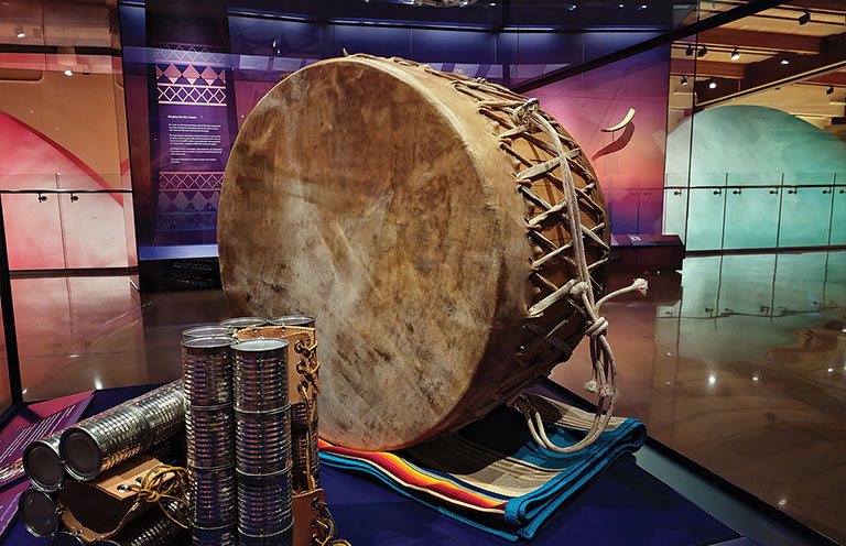 prairie-style leather drum and stomp dance cans on display at the First Americans Museum