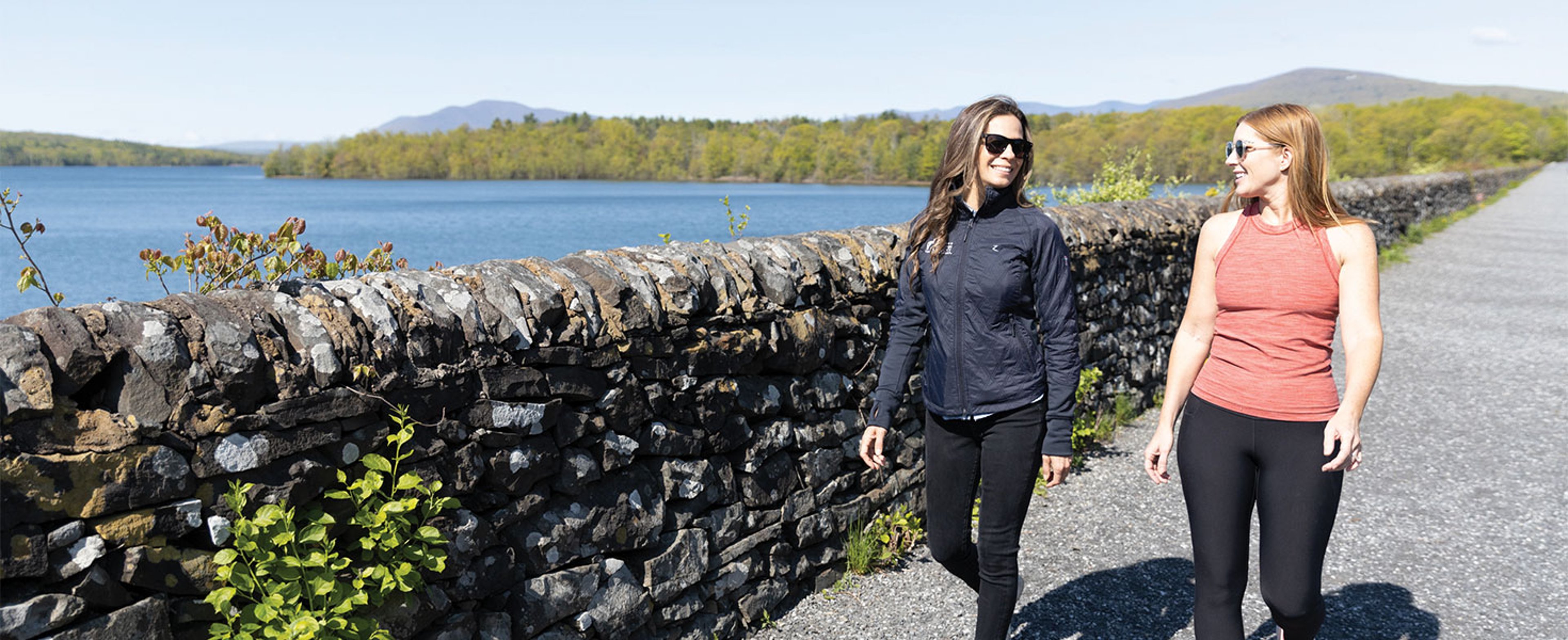 Two women walking along Ashokan Rail Trail