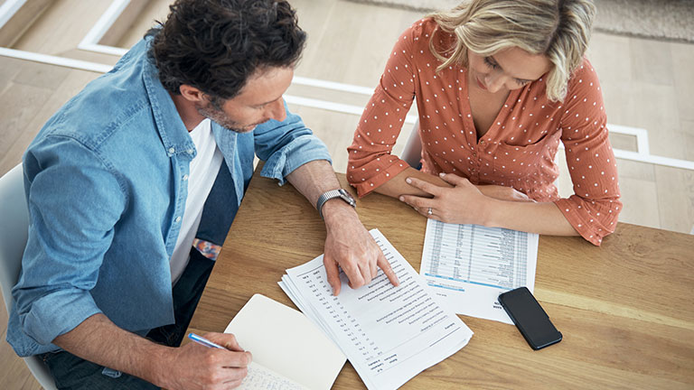 Making their money work for their marriage stock photo
