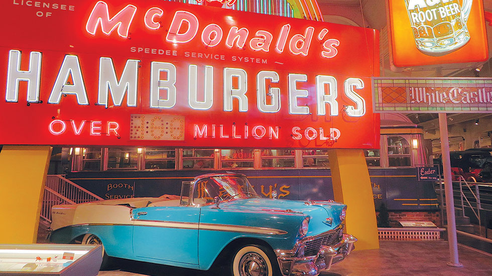 A Chevy Bel Air is part of the vintage neon sign exhibit at The Henry Ford Museum.