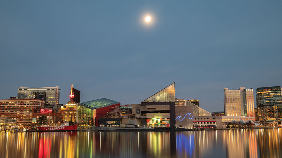 Baltimore’s Inner Harbor dazzles day and night.