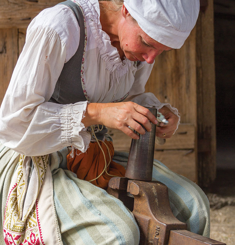 An artisan at work in the Colonial Quarter; photo courtesy of FloridasHistoricCoast.com
