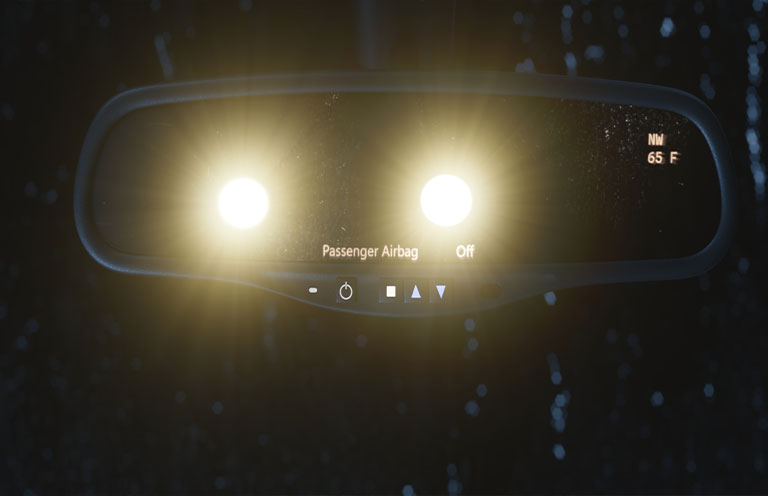 headlights shown in hear mirror